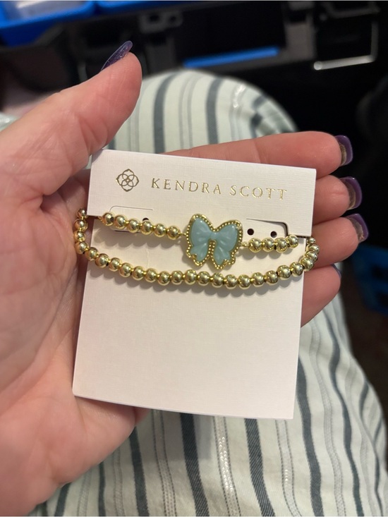 Kendra Scott Jewelry - Kendra Scott Gold Beaded Bracelet with  Blue Bow Charm